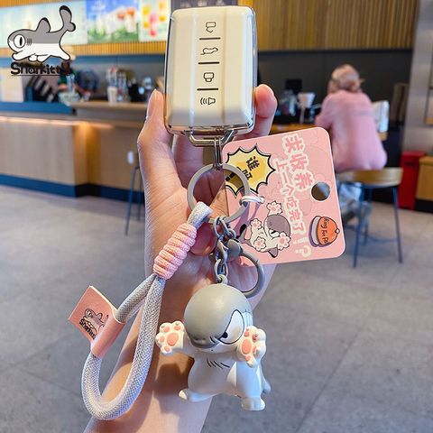 Sharkitty please adopt me keychain charm attached to car keys
