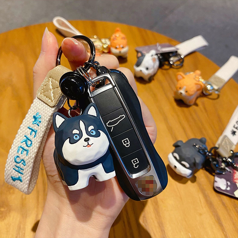 Husky keychain charm attached to a car key fob