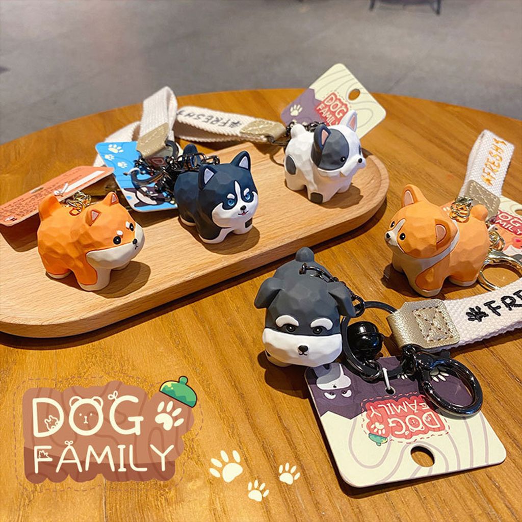 Cute dog family wood carving style keychain charms showing all five designs