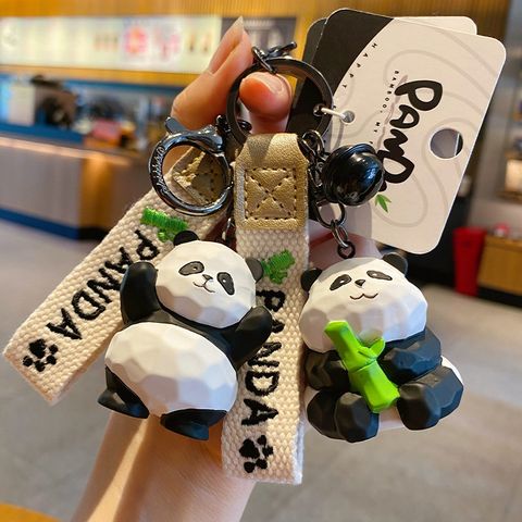 Cute panda wood carving style keychain charms waving panda and panda with bamboo designs