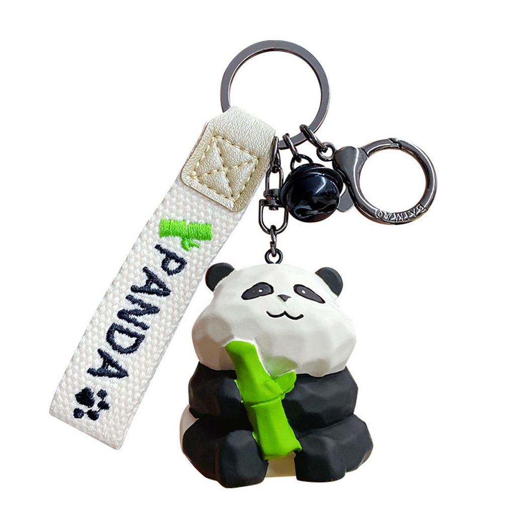 Cute panda wood carving style keychain charm panda with bamboo design on white background
