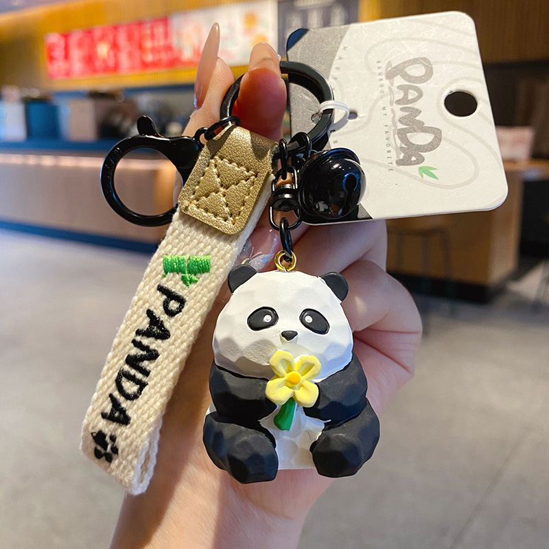 Flower-viewing panda keychain charm