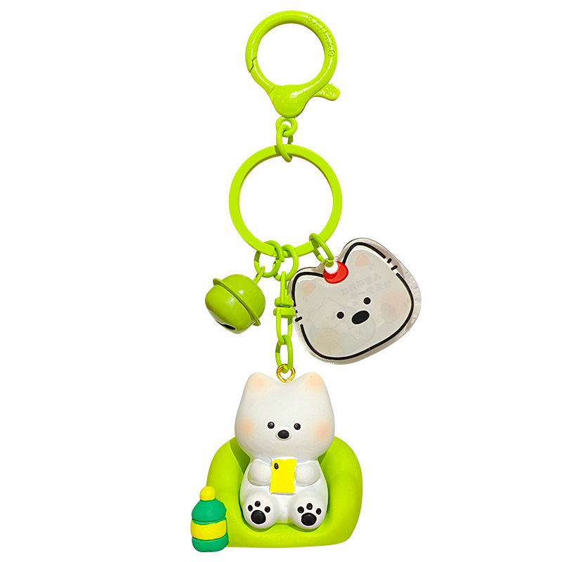 Binge-watching mode keychain charm on white background