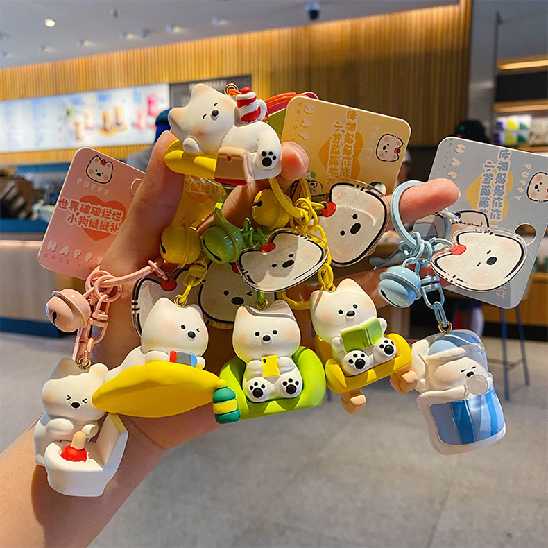 Westie puppy lazy day keychain charms featuring all six designs