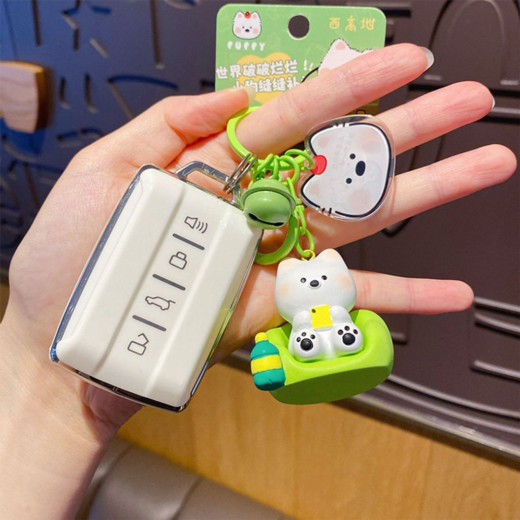Westie puppy lazy day keychain charm binge-watching mode design attached to car keys