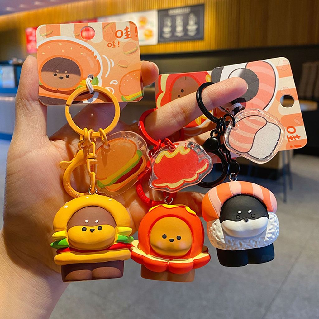 Cute foodie dog keychain charms showing multiple designs