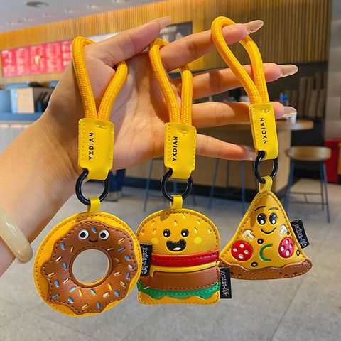 Cute faux leather food keychain charms showing all three designs
