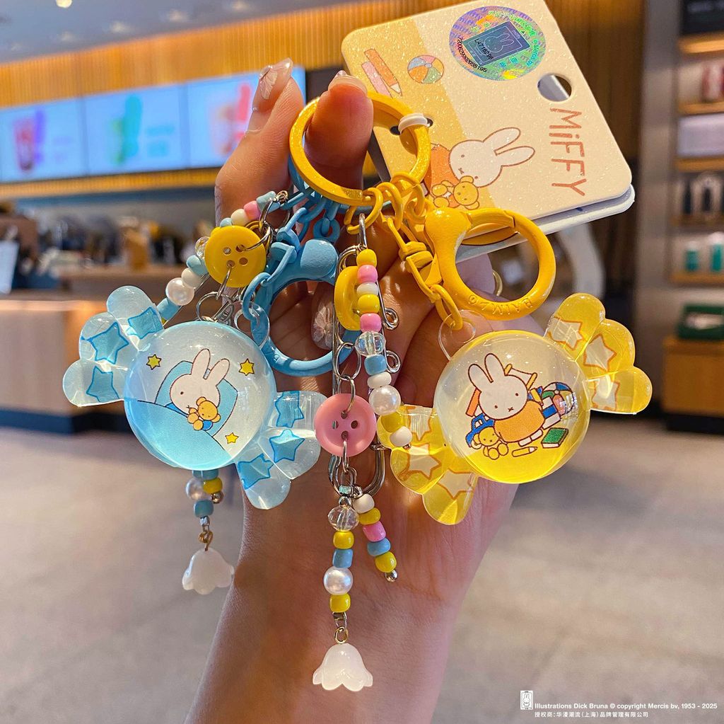Miffy bunny candy keychain charms in blue and yellow