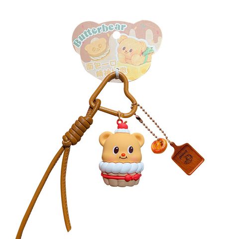 Cupcake keychain charm on white background