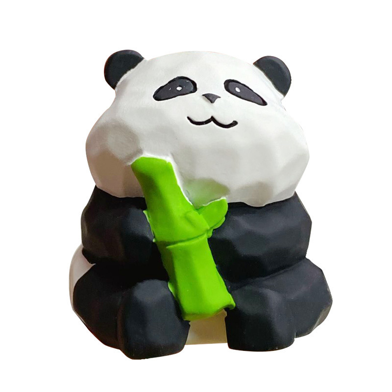 Panda with bamboo mini figurine on white background