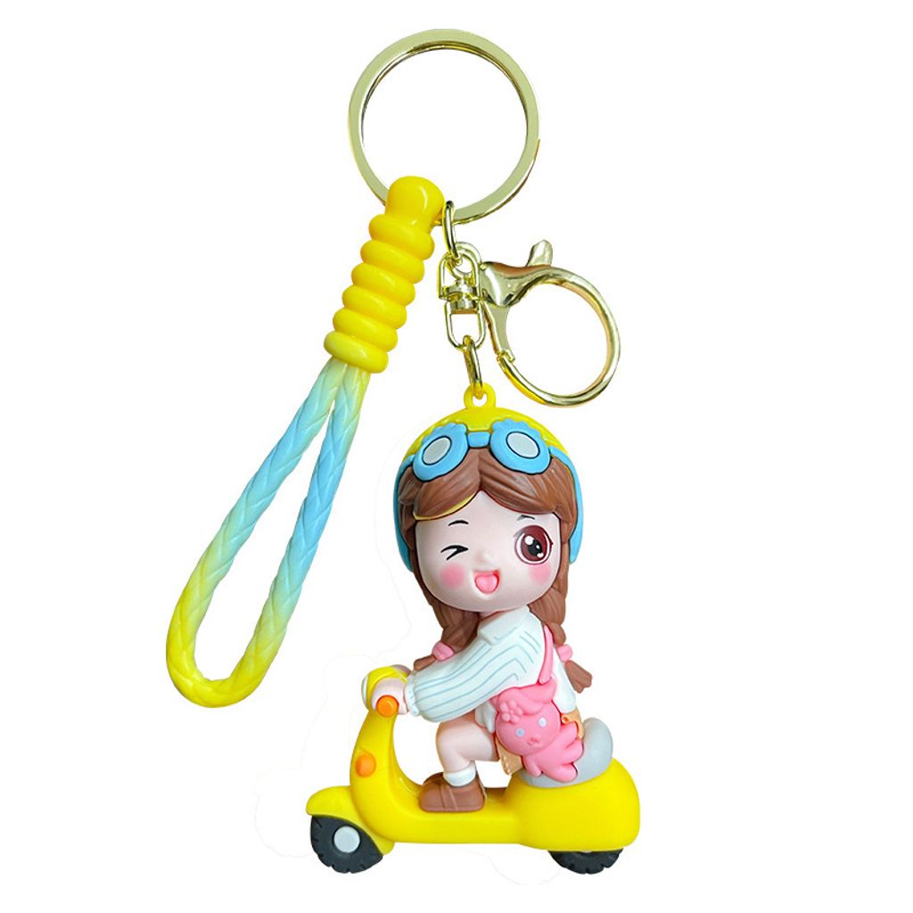Electric scooter girl keychain charm in yellow on white background