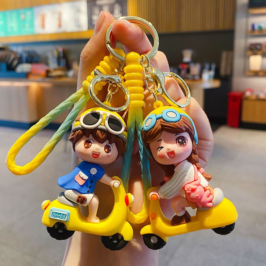 Electric scooter keychain charms boy and girl in yellow