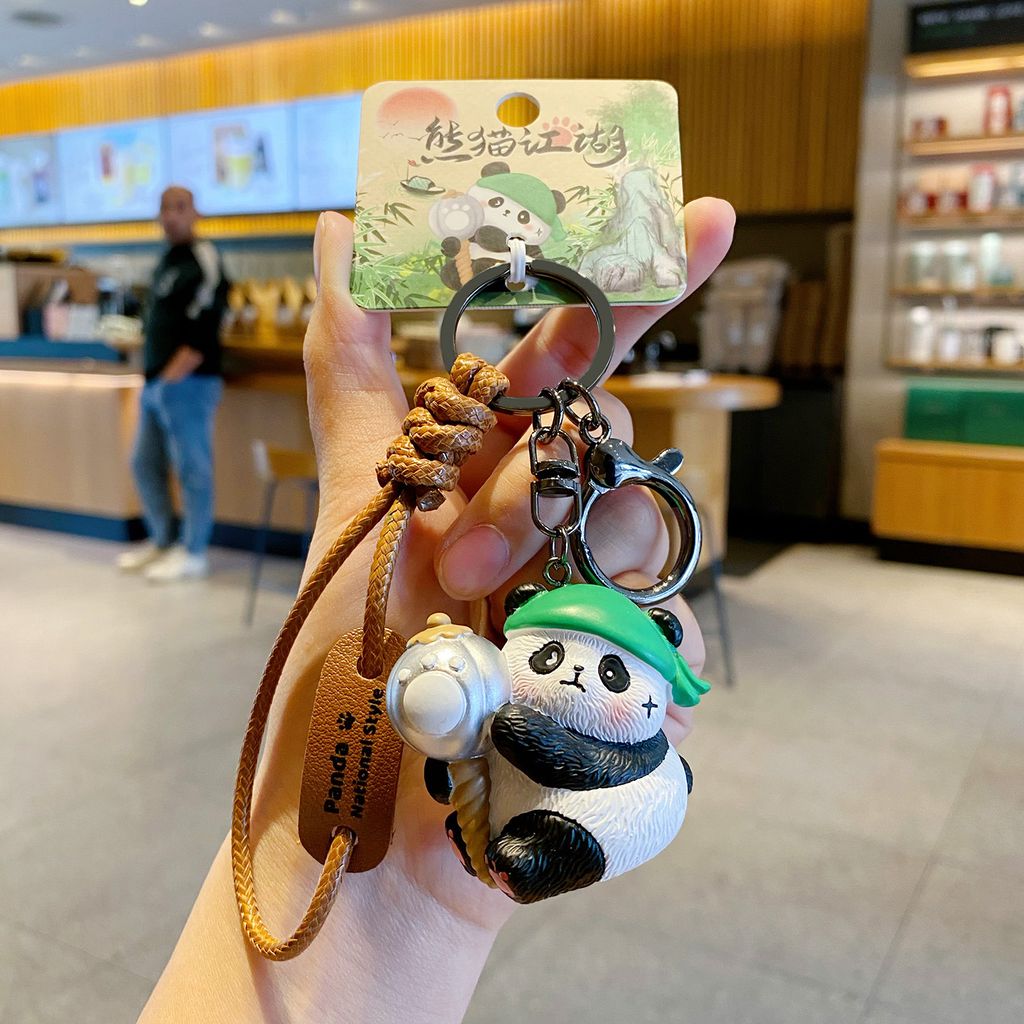 Clumsy panda keychain charm