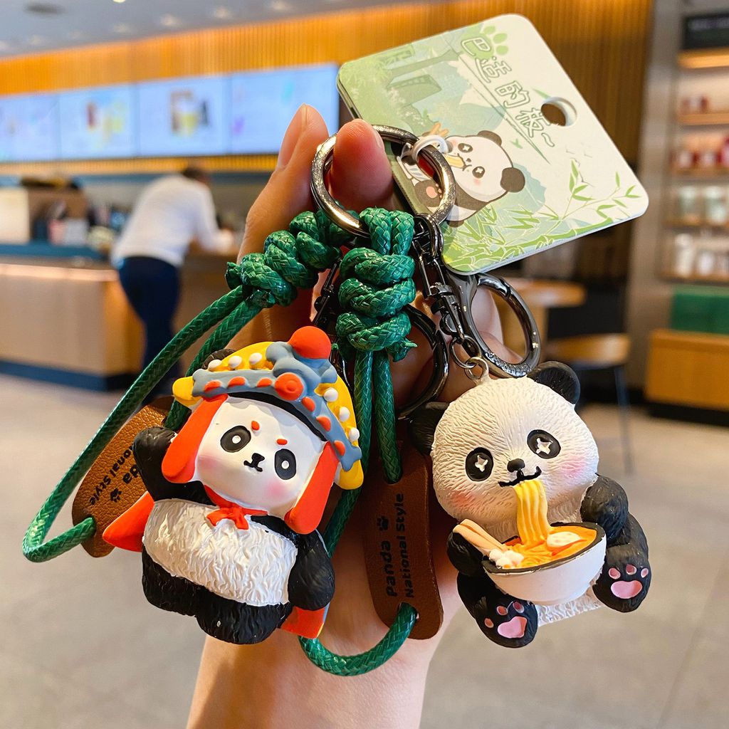 Face-changing panda and malatang panda keychain charms