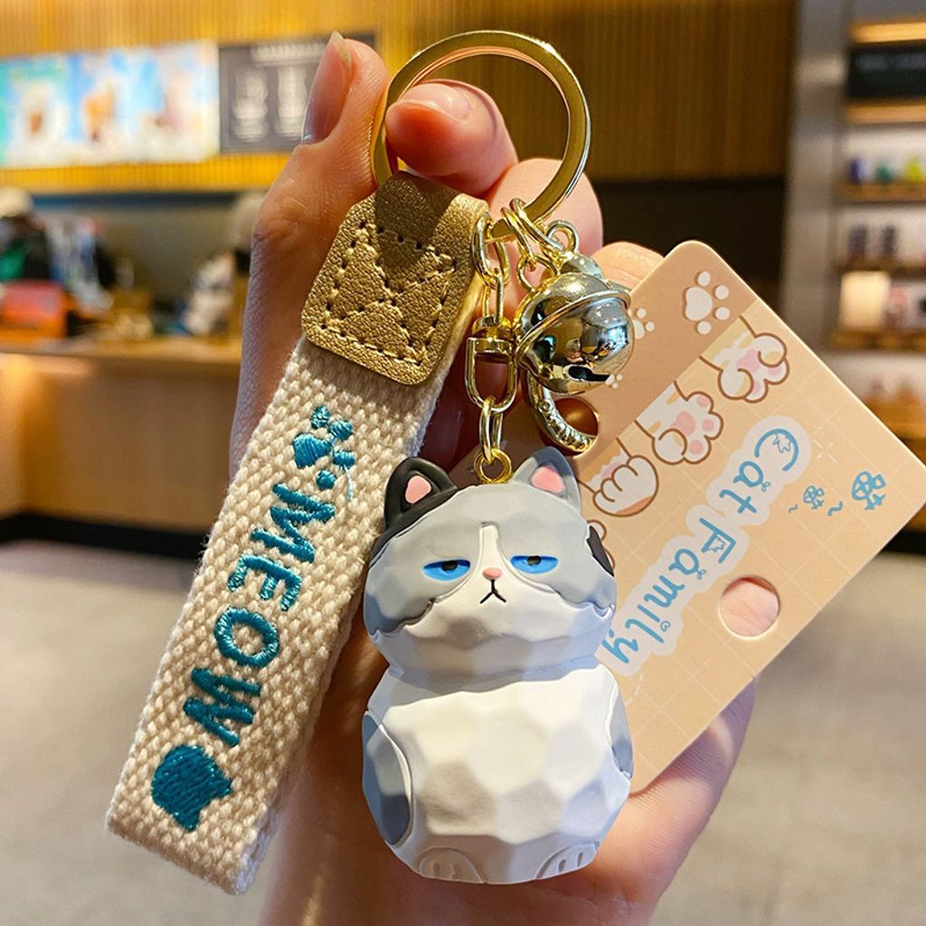 Blue and white cat keychain charm