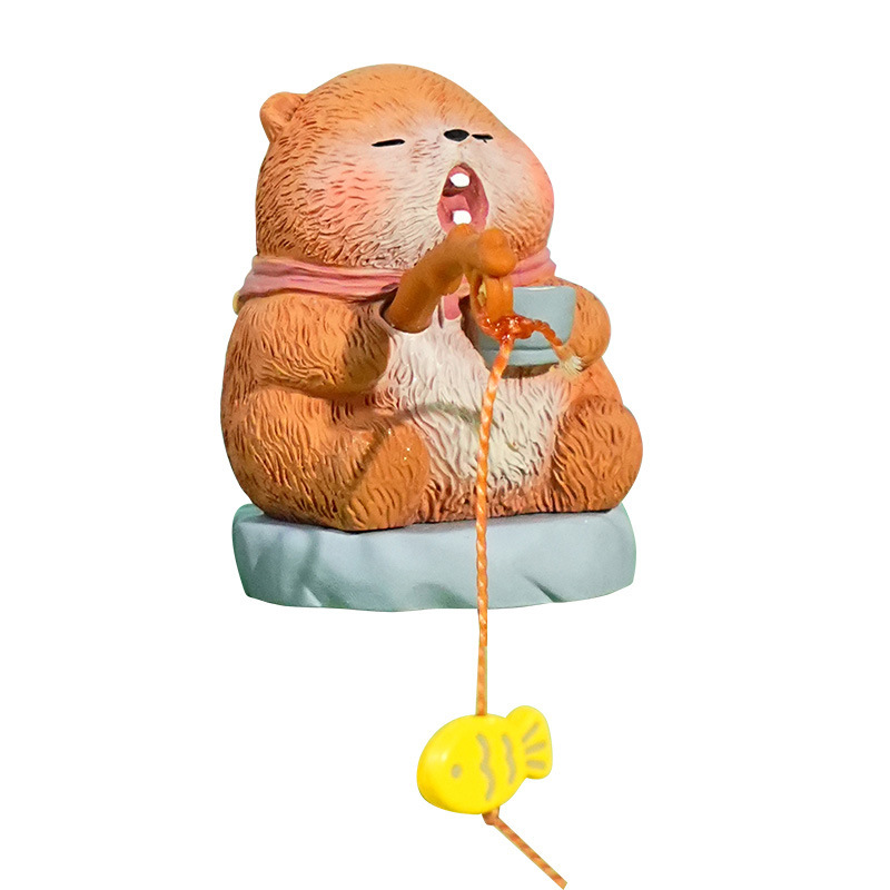 Groundhog fishing mini figurine on white background