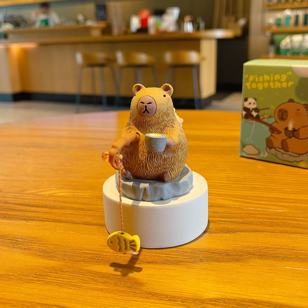 Capybara fishing mini figurine