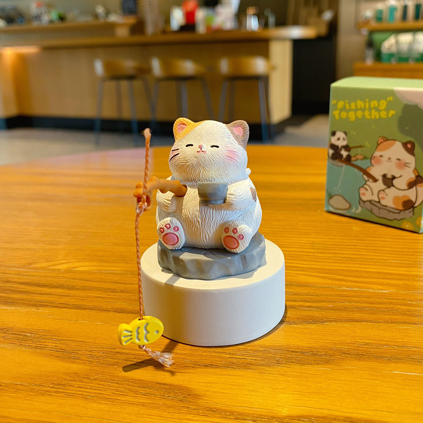 Calico cat fishing mini figurine