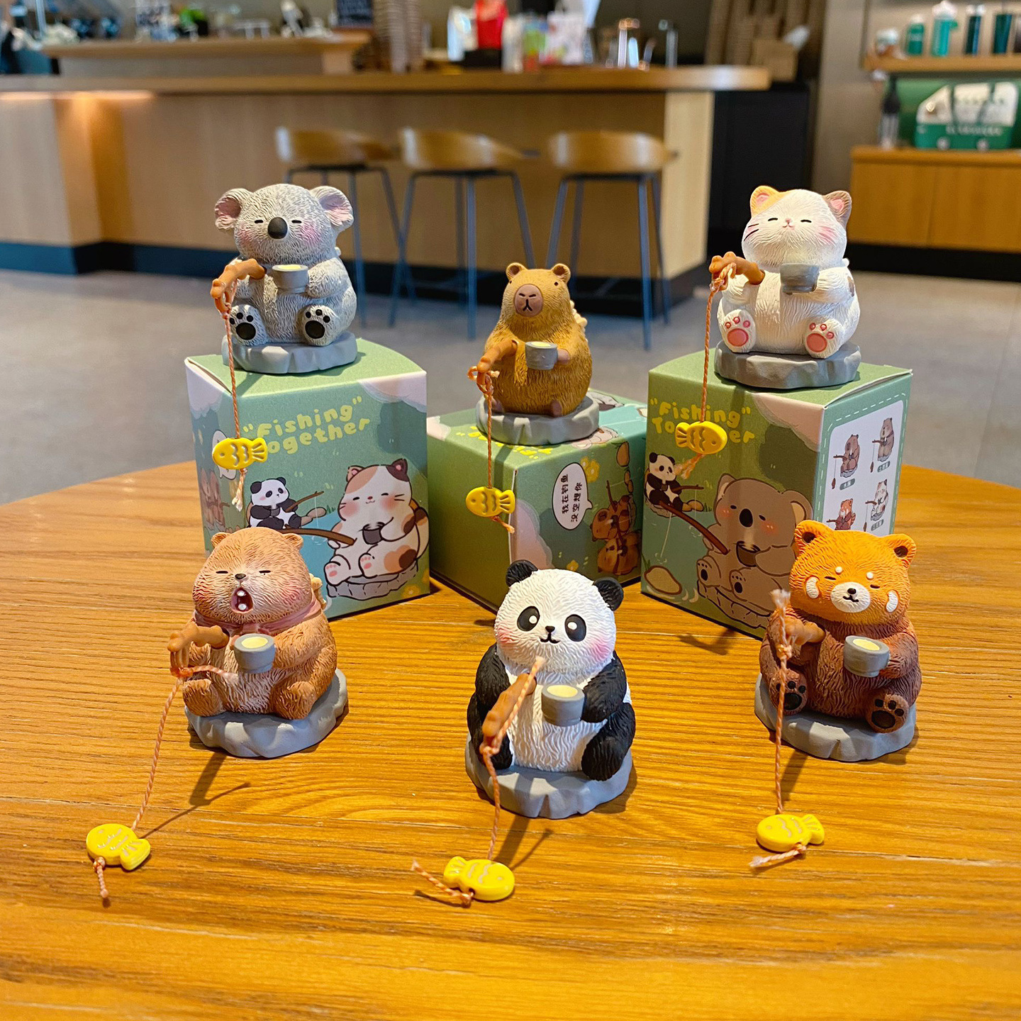 Oriental-style cute pet fishing mini figurines featuring all six designs