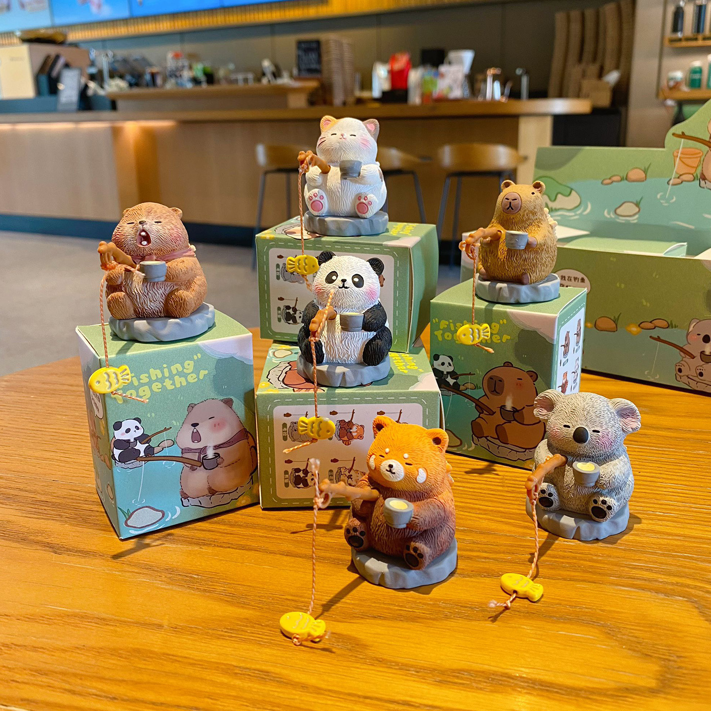 Oriental-style cute pet fishing mini figurines featuring all six designs