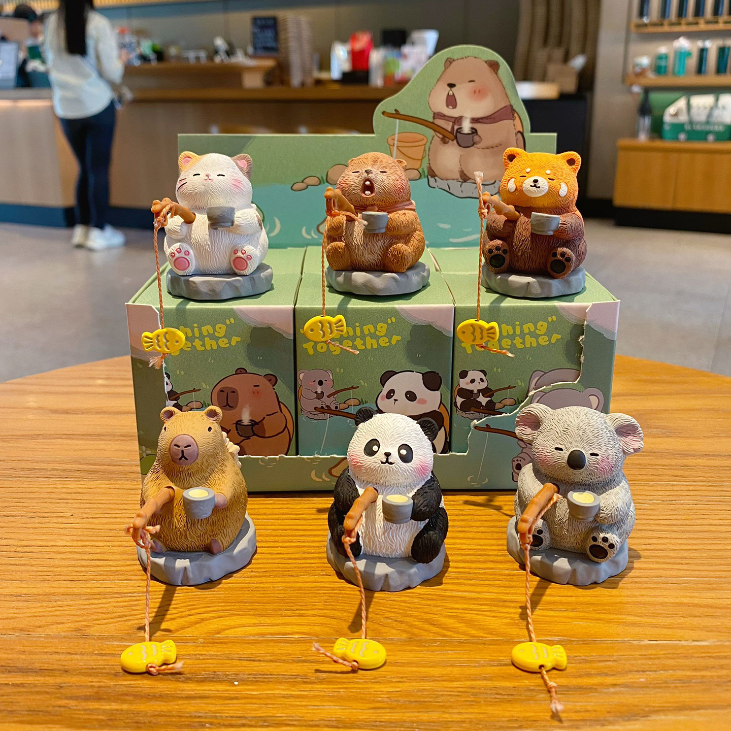 Oriental-style cute pet fishing mini figurines featuring all six designs