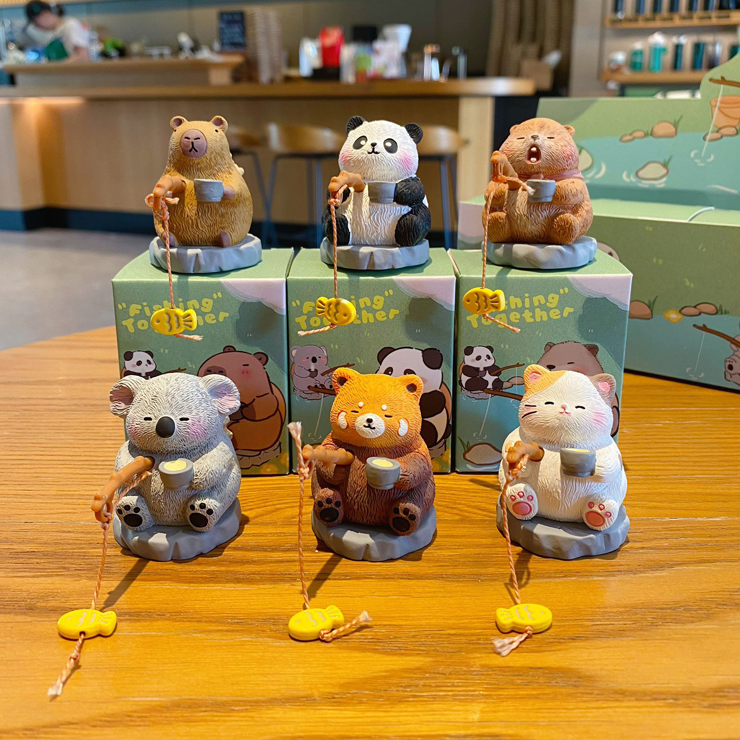 Oriental-style cute pet fishing mini figurines featuring all six designs