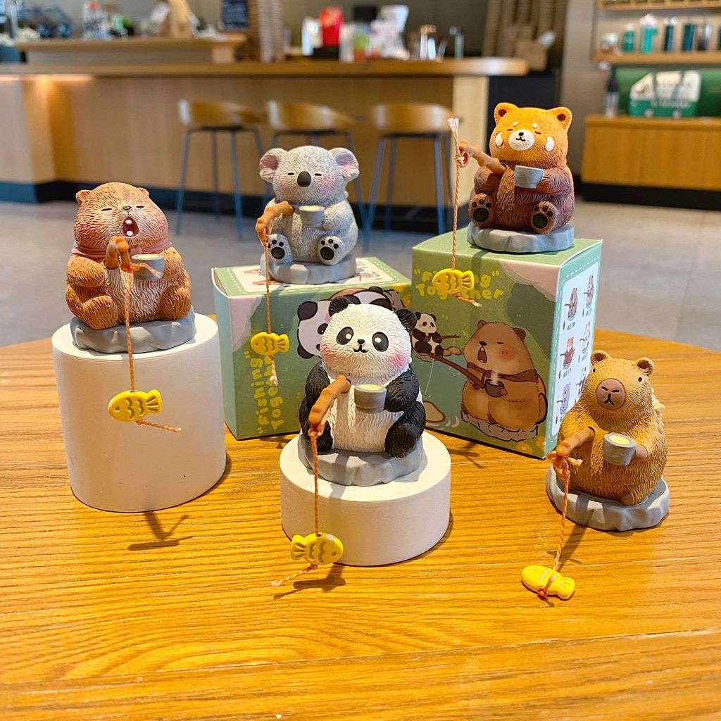 Oriental-style cute pet fishing mini figurines showing multiple designs