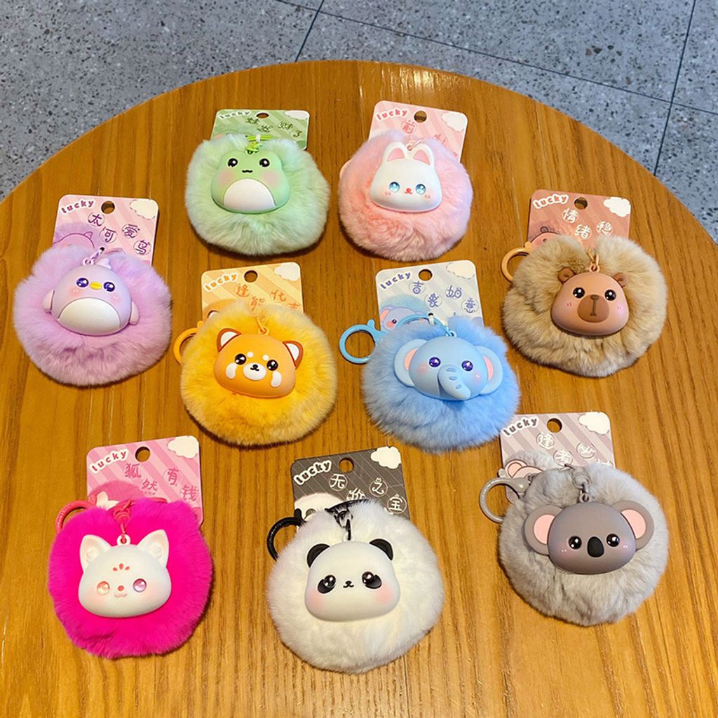 Cute fluffy animal pom pom keychain charms featuring all nine designs