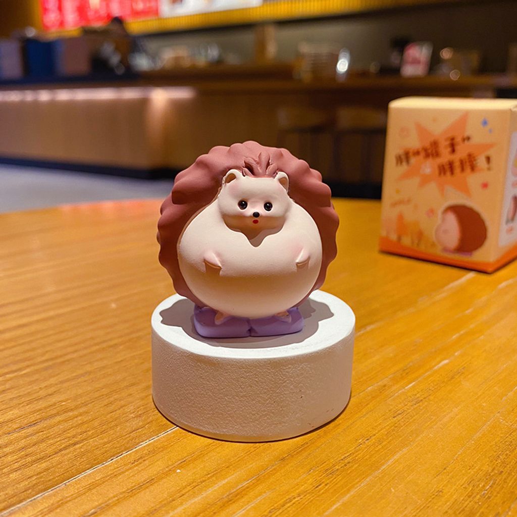 Hedgehog on scale mini figurine