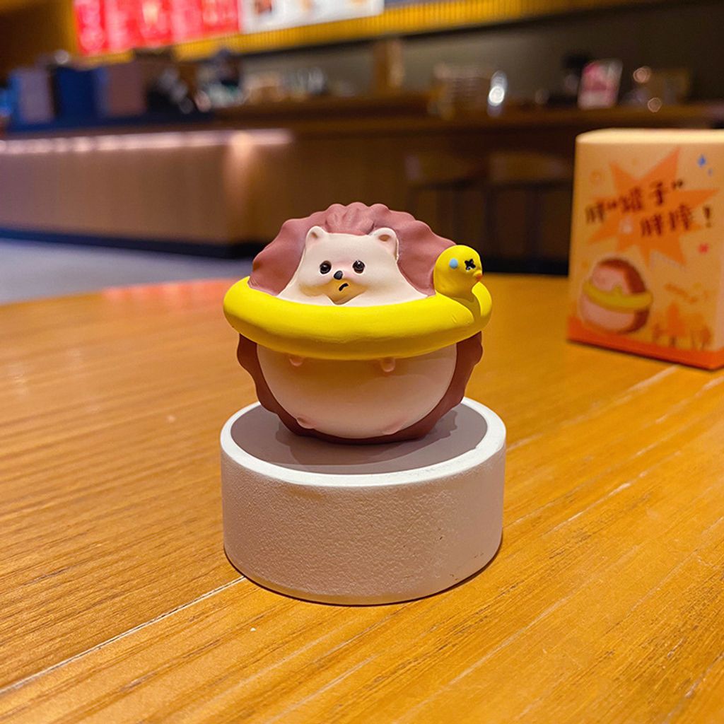 Hedgehog with swim ring mini figurine