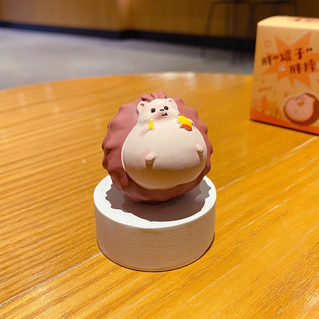 Hedgehog eating chips mini figurine