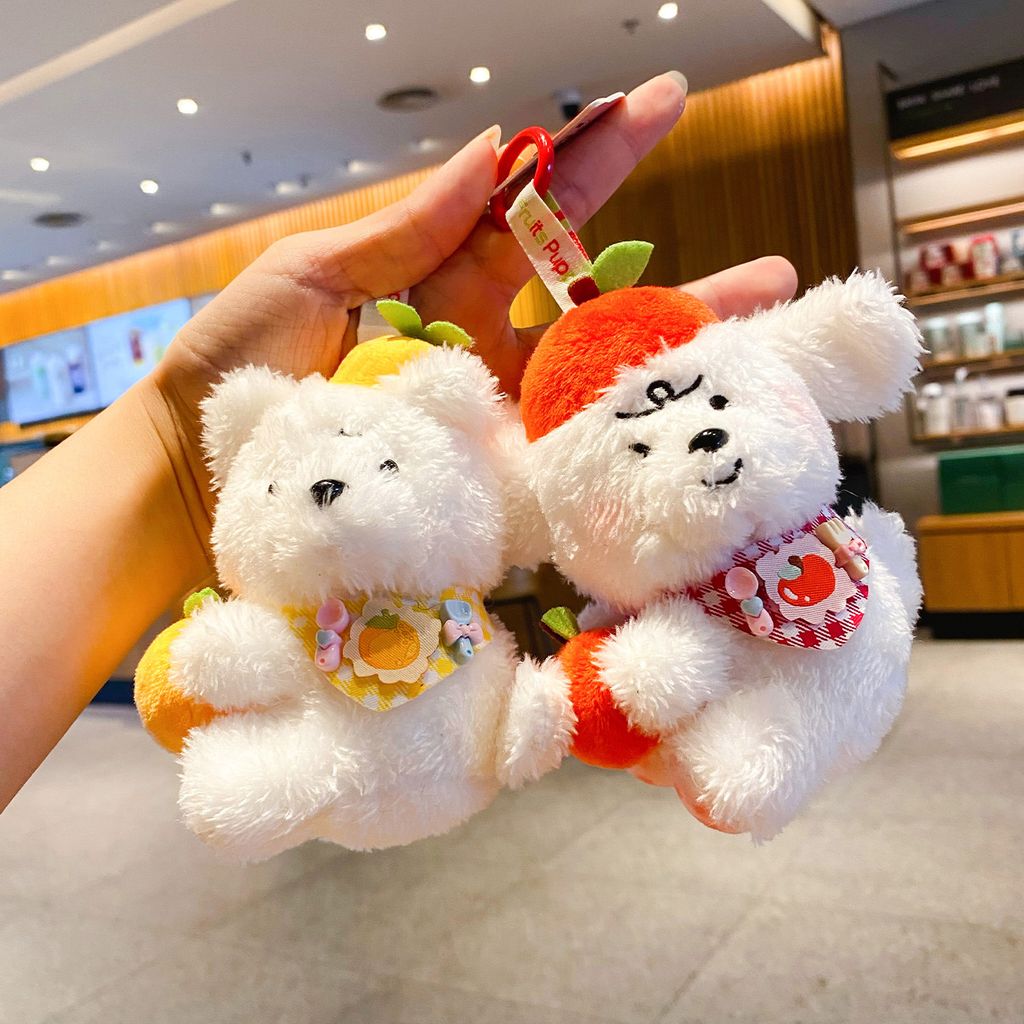 Orange puppy and apple puppy keychain charms