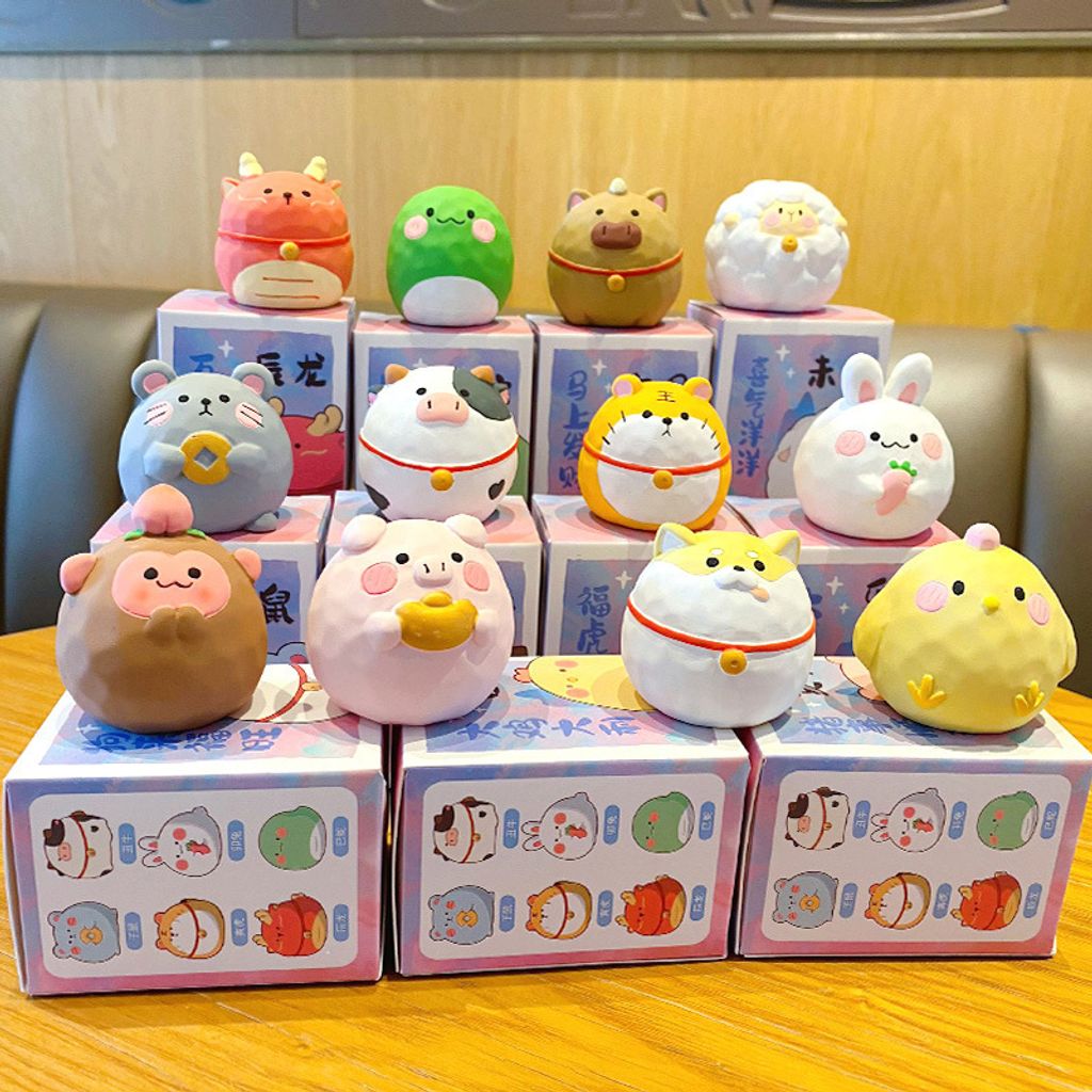 Cute round Chinese Zodiac mini figurines featuring all twelve animals in a wood-carving style design