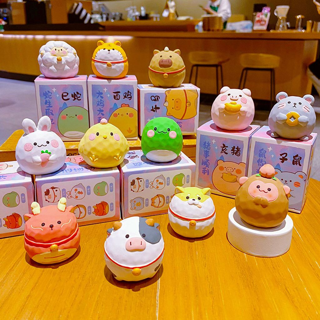 Cute round Chinese Zodiac mini figurines featuring all twelve animals in a wood-carving style design