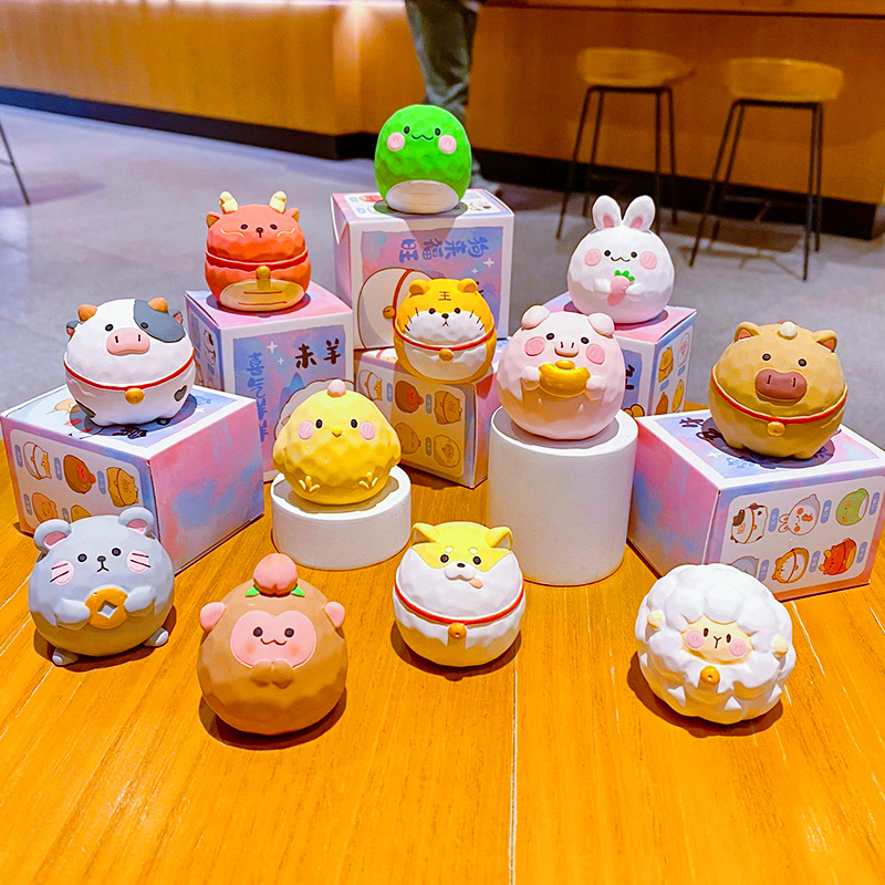 Cute round Chinese Zodiac mini figurines featuring all twelve animals in a wood-carving style design