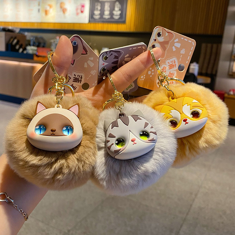 Cute fluffy cat pom pom keychain charms showing multiple designs