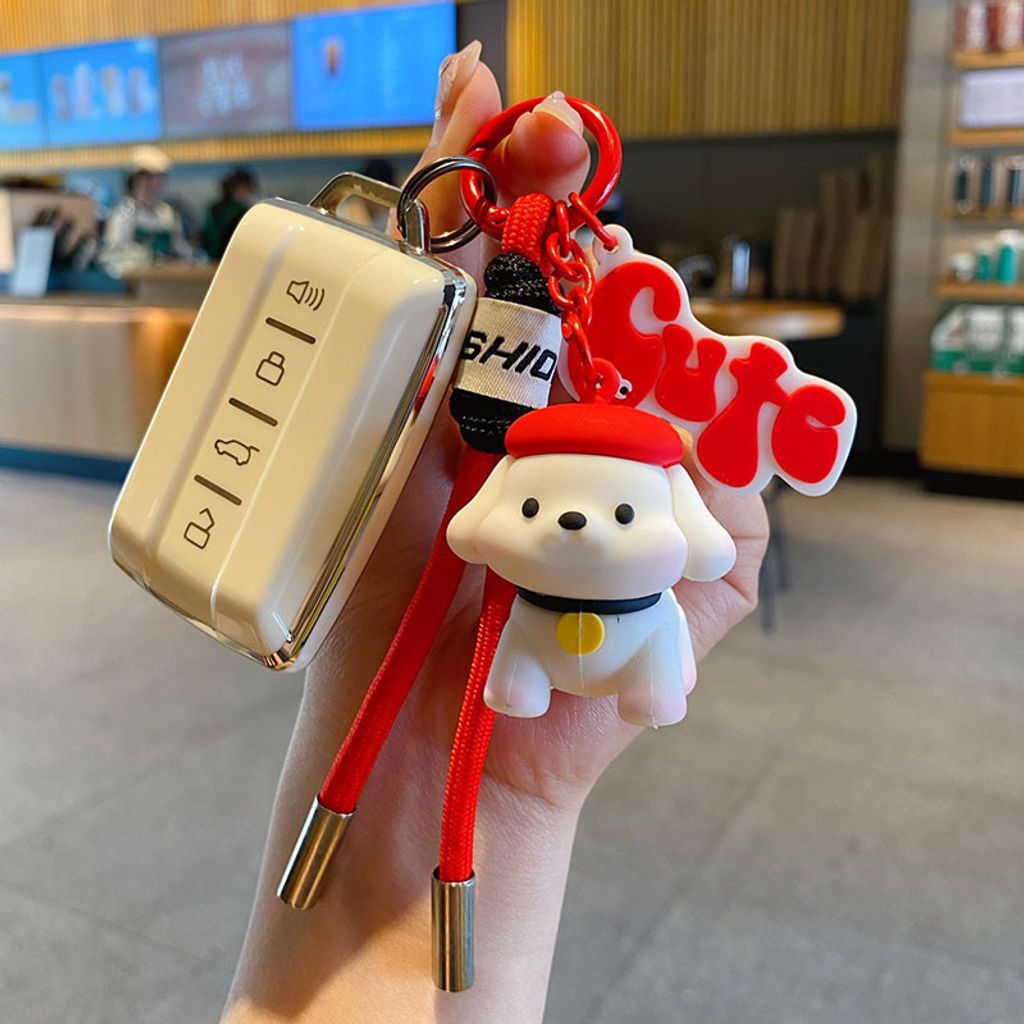 Fun fun puppy keychain charm in red attached to car key fob