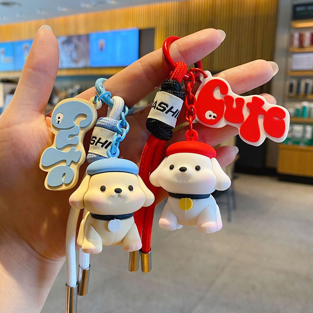 Fun fun puppy keychain charms in blue and red, featuring cute dog designs with matching straps.