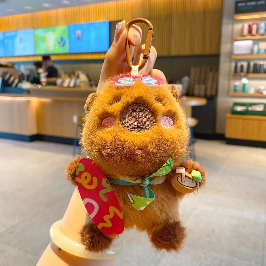Capybara plush skateboard keychain charm