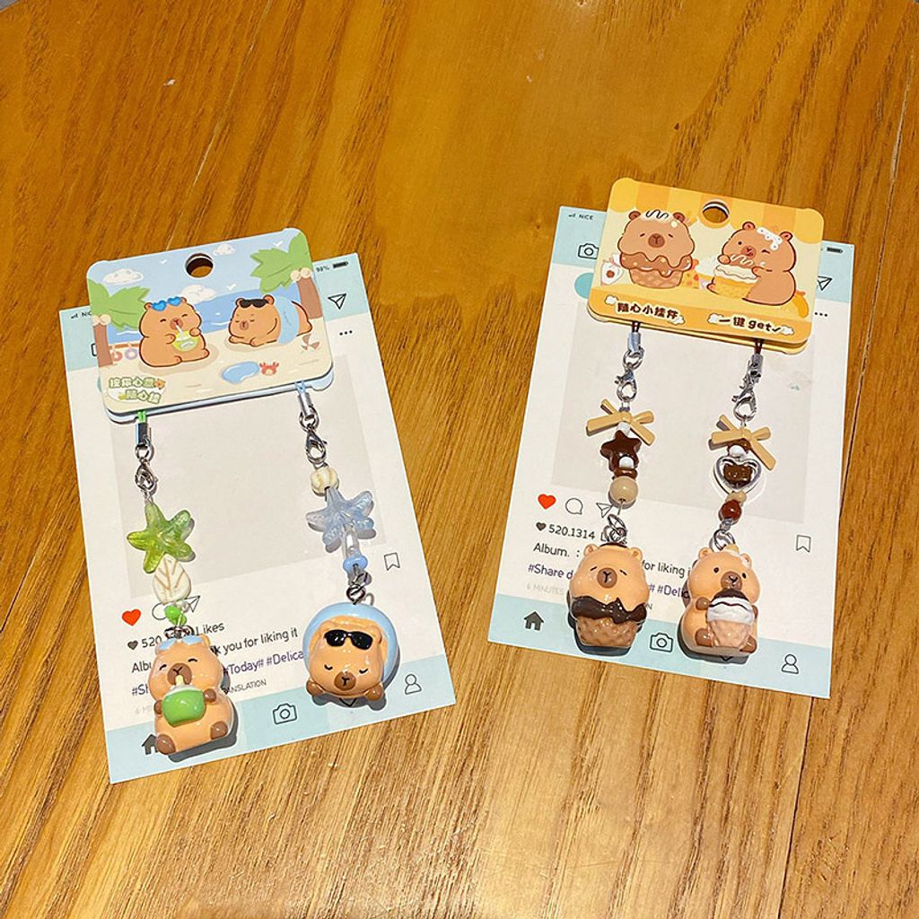 Beach capybara and dessert capybara beaded keychain charm pairs