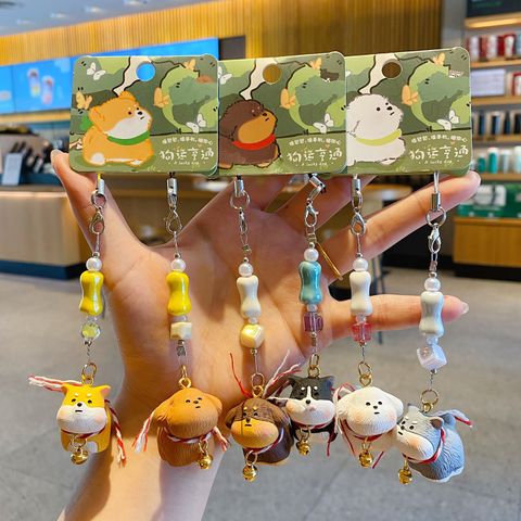 Shiba Inu and Teddy Poodle puppy keychain charm pair, Dachshund and Husky puppy keychain charm pair, and Bichon Frise and Schnauzer puppy keychain charm pair