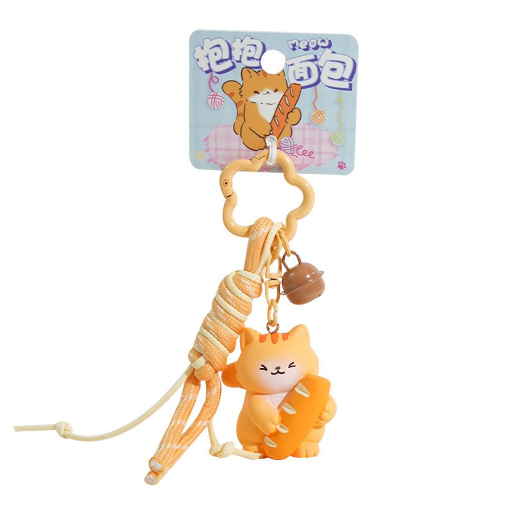 Cute bread cat keychain charm on white background