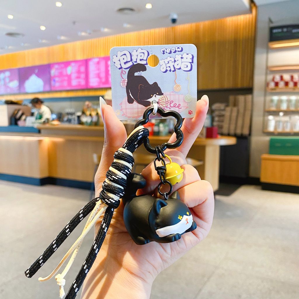 Cute little hunter cat keychain charm