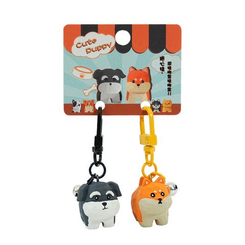 Adorkable puppy keychain charm pair on white background