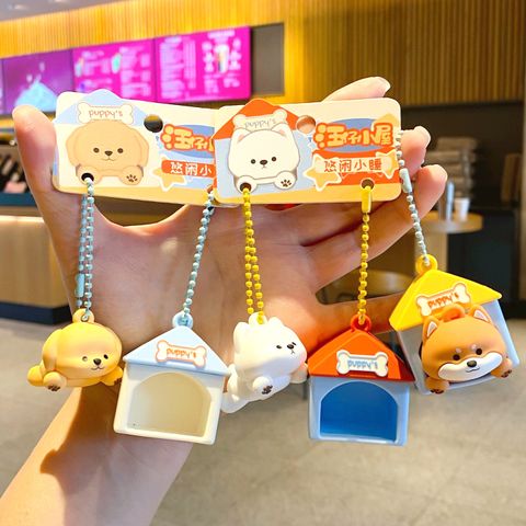 Cute puppy house keychain charms showing multiple dog designs