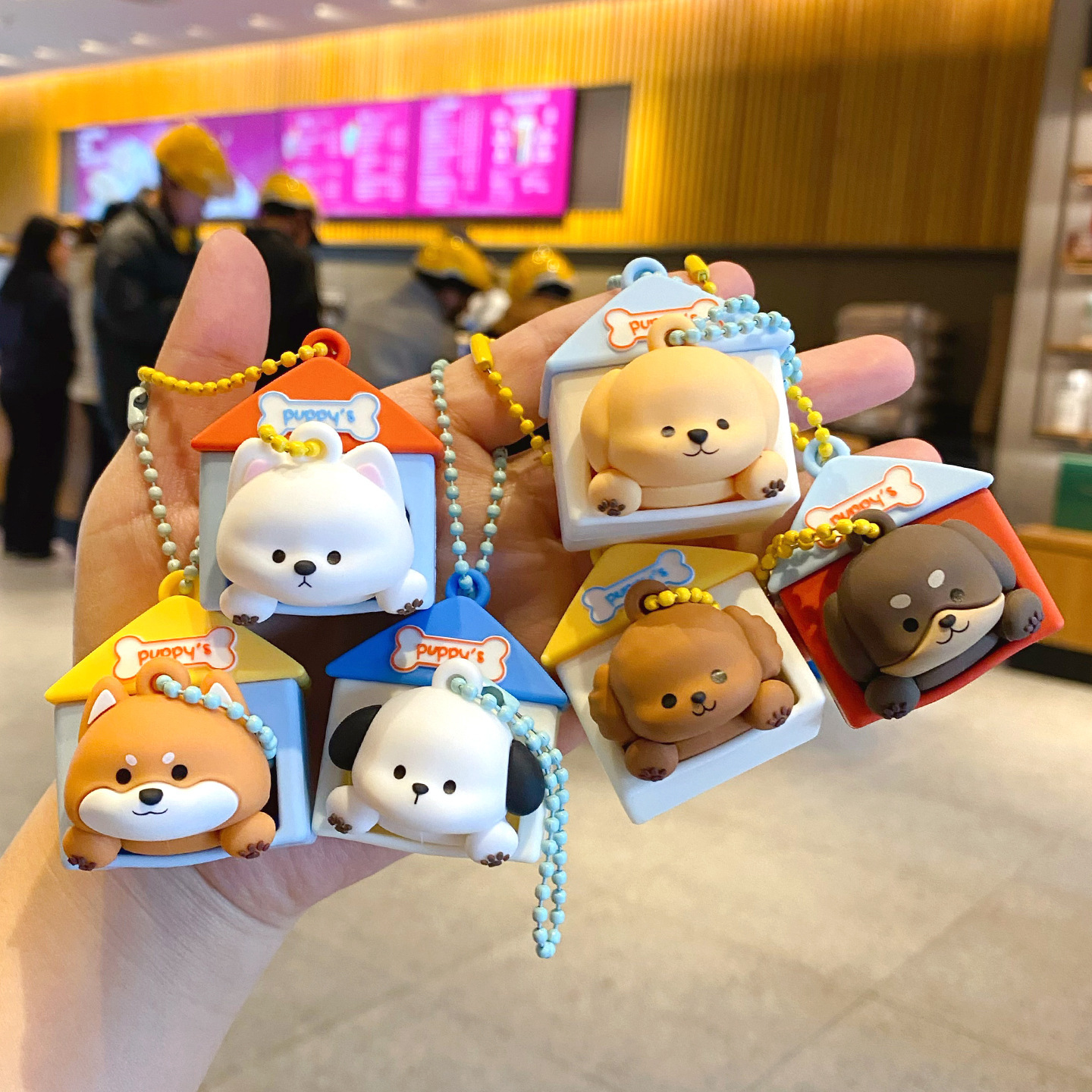 Cute puppy house keychain charms featuring all six designs