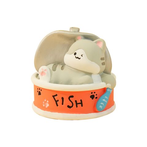 Cat can mini figurine on white background