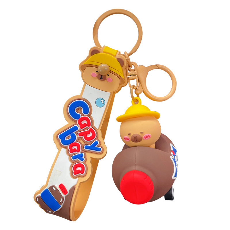 Cute capybara in a brown cola bottle car keychain charm on white background