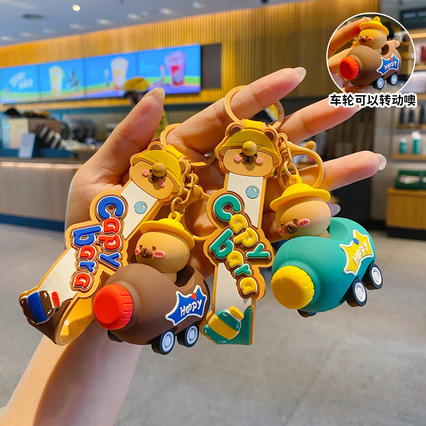 Cute capybara cola bottle car keychain charms in brown and turquoise