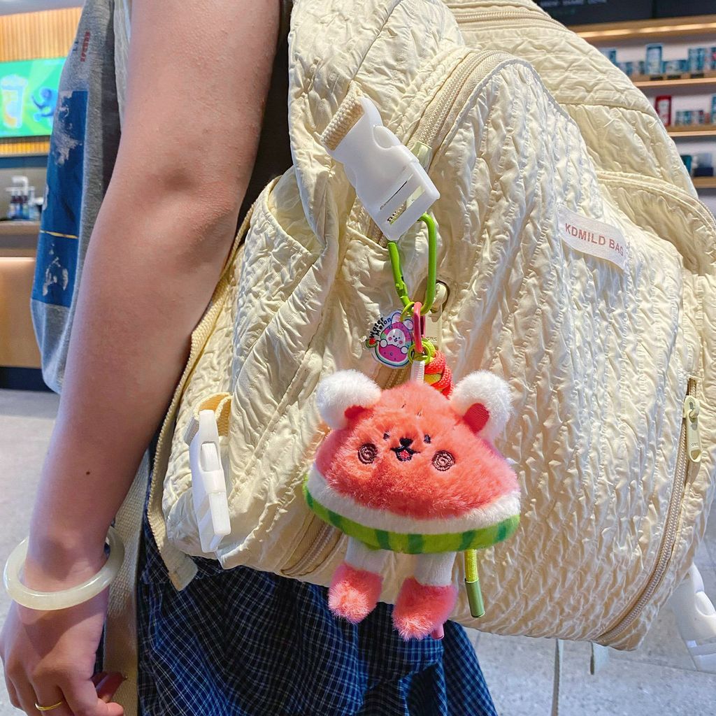 Cute watermelon rabbit plush keychain charm hanging on a bag